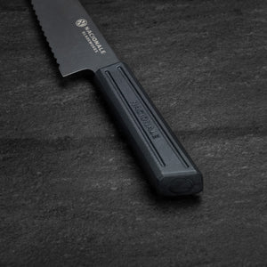 165mm Serrated Petty Knife. Black Stonewashed AUS8. Black Recycled Plastic Skateboard Material Handle - Nacionale Bladeworks